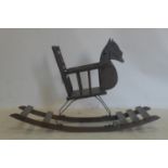 An early 20th century oak child's rocking chair, with horse head, H.56 W.89 D.37cm