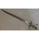 A French 1842 Yataghan bayonet with steel scabbard, bearing various markings and inscriptions to