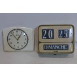 A vintage Italian enamelled Brillie wall clock together with a vintage Garant ceramic clock