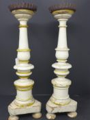 A pair of painted turned pine pricket sticks, H.42cm