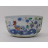 A Chinese doucai bowl, decorated with chickens and birds amongst flowers, with double blue circle to