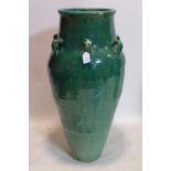A large Persian green glazed Sharab wine vessel, H.90cm