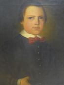 19th century Continental school, Portrait of a young boy, oil on canvas, in modern black frame, 46 x