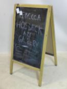 A folding blackboard sign