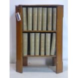 An Art Deco oak bookcase, H.78 W.56 D.38cm, together with a collection of 1950's National Geographic