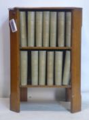 An Art Deco oak bookcase, H.78 W.56 D.38cm, together with a collection of 1950's National Geographic