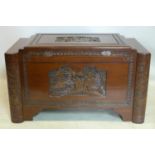 A 20th century Chinese carved camphor wood trunk, H.59 W.100 D.54cm