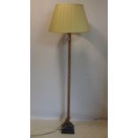 A 20th century bamboo standard lamp on ebonized base, H.161cm