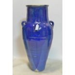 A Persian blue glazed Sharab wine vessel, H.74cm