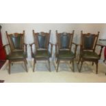 A set of four oak dining chairs