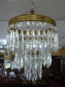 A Venetian style drop chandelier together with a pair of matching wall lights