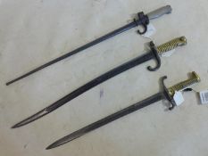 Three 19th century bayonets to include a French 1866 Chassepot bayonet bearing various markings