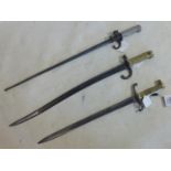 Three 19th century bayonets to include a French 1866 Chassepot bayonet bearing various markings