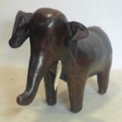 An Omersa leather clad elephant, H.54 W.81 D.24cm