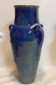 A Persian blue glazed Sharab wine vessel, H.76cm