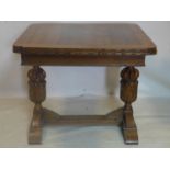 An early 20th century oak draw leaf dining table, H.76 W.150 D.90cm