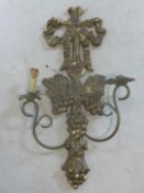 A gilt two branch wall sconce, with ribbon finial and grape bunch decoration, 86 x 53cm