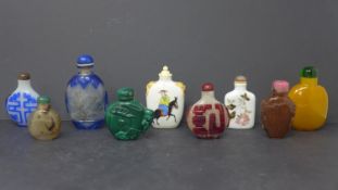 A collection of 9 Chinese snuff bottles, to include a late 19th century reverse glass painted