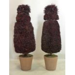 A pair of faux plants in terracotta pots, H.113cm