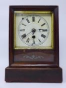 A 19th century American mahogany mantle clock with pendulum, H.25 W.18 D.12cm