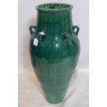 A large Persian green glazed Sharab wine vessel, H.90cm