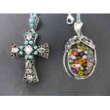 Two silver pendant necklaces, to include one Murano Millefiori example in a pierced floral mount,