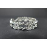 WITHDRAWN-A silver and cubic zirconia Chanel style bracelet