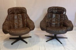 A pair of 1960/70's Danish leather swivel armchairs by H.W. Klein for Bramin