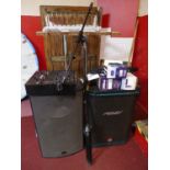 A Peavey HIsys 2XT speaker together with a turbo sound speaker, a Numark mixer and other items