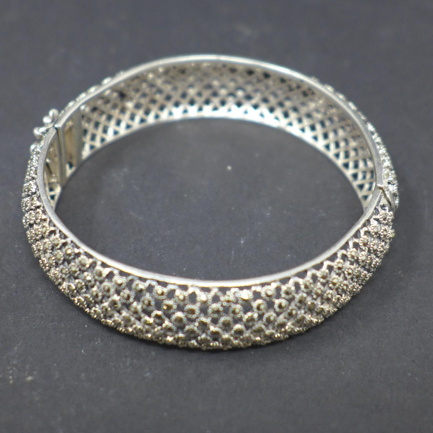 A silver and marcasite hinged bangle, Diameter 6.5cm - Image 2 of 3