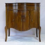 An early 20th century walnut gramophone cabinet, H.90 W.84 D.50cm