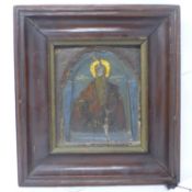 An early 20th century Greek icon on panel, signed and dated 1902 to verso, with Bonhams label, 21