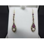 A pair of drop earrings set with rubies, diamonds and pearls, boxed