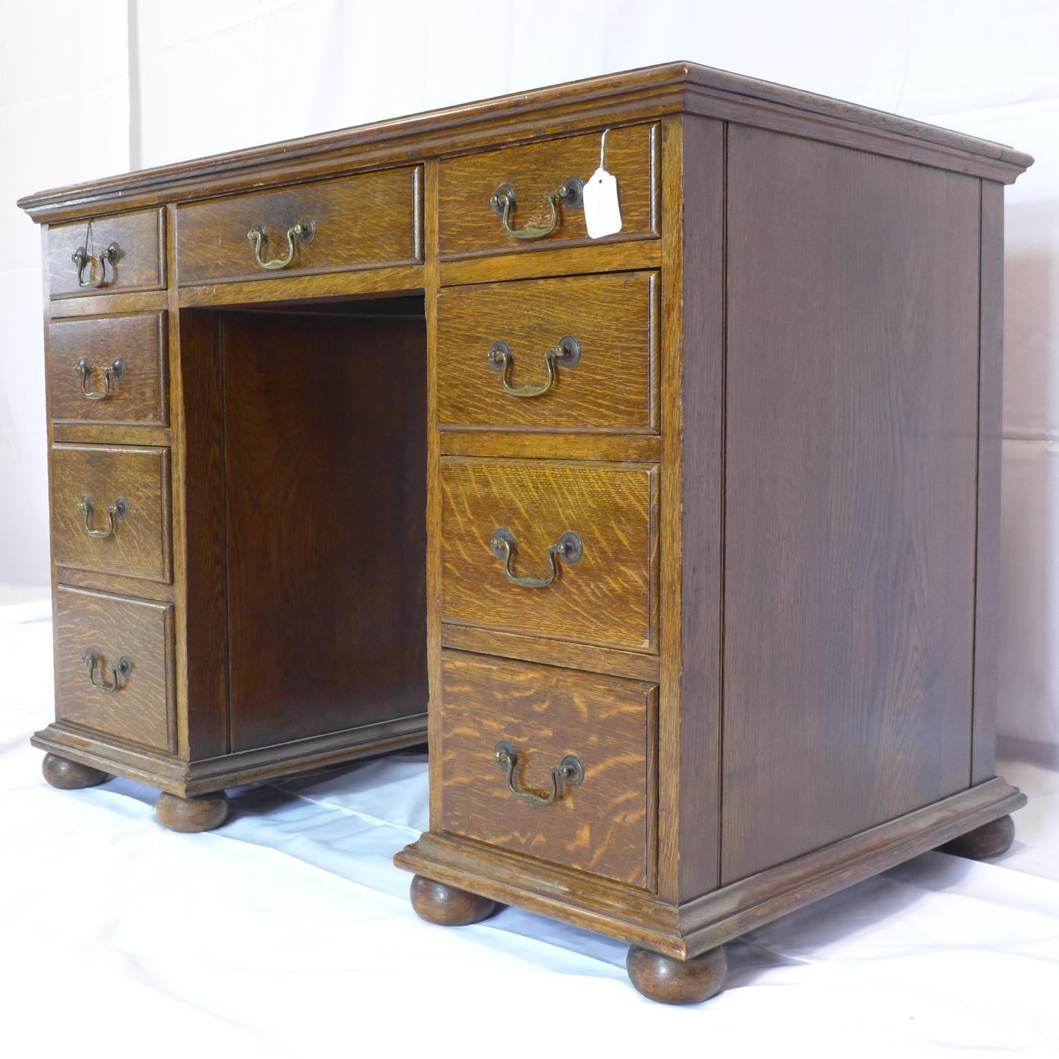 An early 20th century oak kneehole desk, H.77 W.106 D.61cm - Image 2 of 3