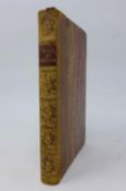 An 1870 edition of Pride & Prejudice by Jane Austen, Tauchnitz edition vol 1112, brown leather