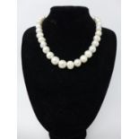 A white cultured pearl necklace with 9ct white gold ball clasp
