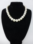 A white cultured pearl necklace with 9ct white gold ball clasp