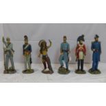 Six large resin figures of soldiers and a native American