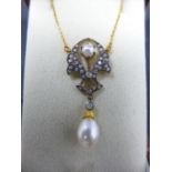 A necklace set with diamonds and pearls, on 9ct yellow gold chain, boxed