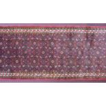 A North-West Persian Malayer runner, repeating stylised diamond motifs with petal motifs on a