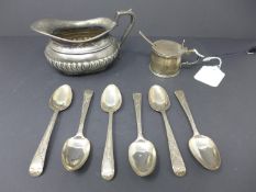 A collection of silver teaspoons, with makers mark 'CH', together with a mustard pot with blue glass