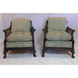 A pair of Edwardian mahogany bergere armchairs in the Chippendale manner