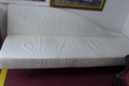 A contemporary white leather chaise longue, L.240cm