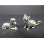 Two sterling silver animals, to include a cat, H.2.3 W.4.5cm, and a poodle, H.1.8 W.3cm