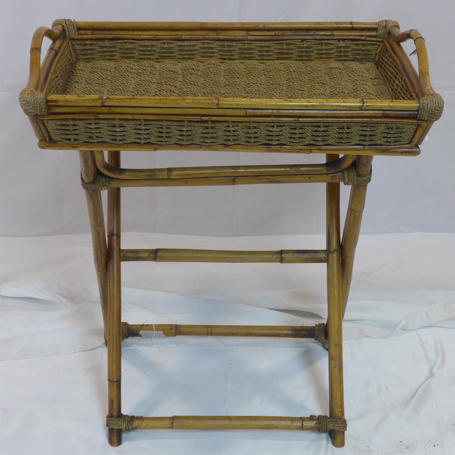 An early 20th century bamboo and wicker butlers tray on stand