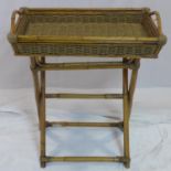 An early 20th century bamboo and wicker butlers tray on stand