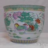 A large 20th century Chinese porcelain jardiniere painted with flowers, ducks and fish, with