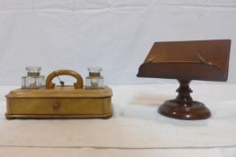 A 19th century mahogany table top reading stand together with a walnut desk stand with 2 inkwells