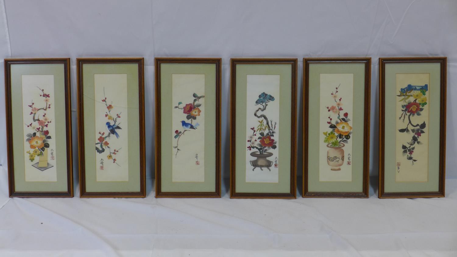 A set of six Chinese paintings on textile of flowers and birds, each signed and with red seal