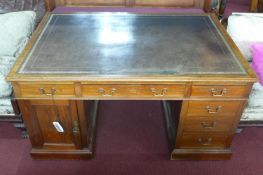 A late 19th/early 20th century Maple & co mahogany partners pedestal desk with leather skiver, H.